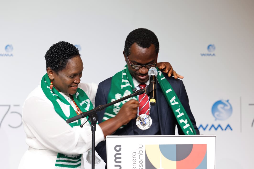 Dr Udoka decorating World Medical Association President